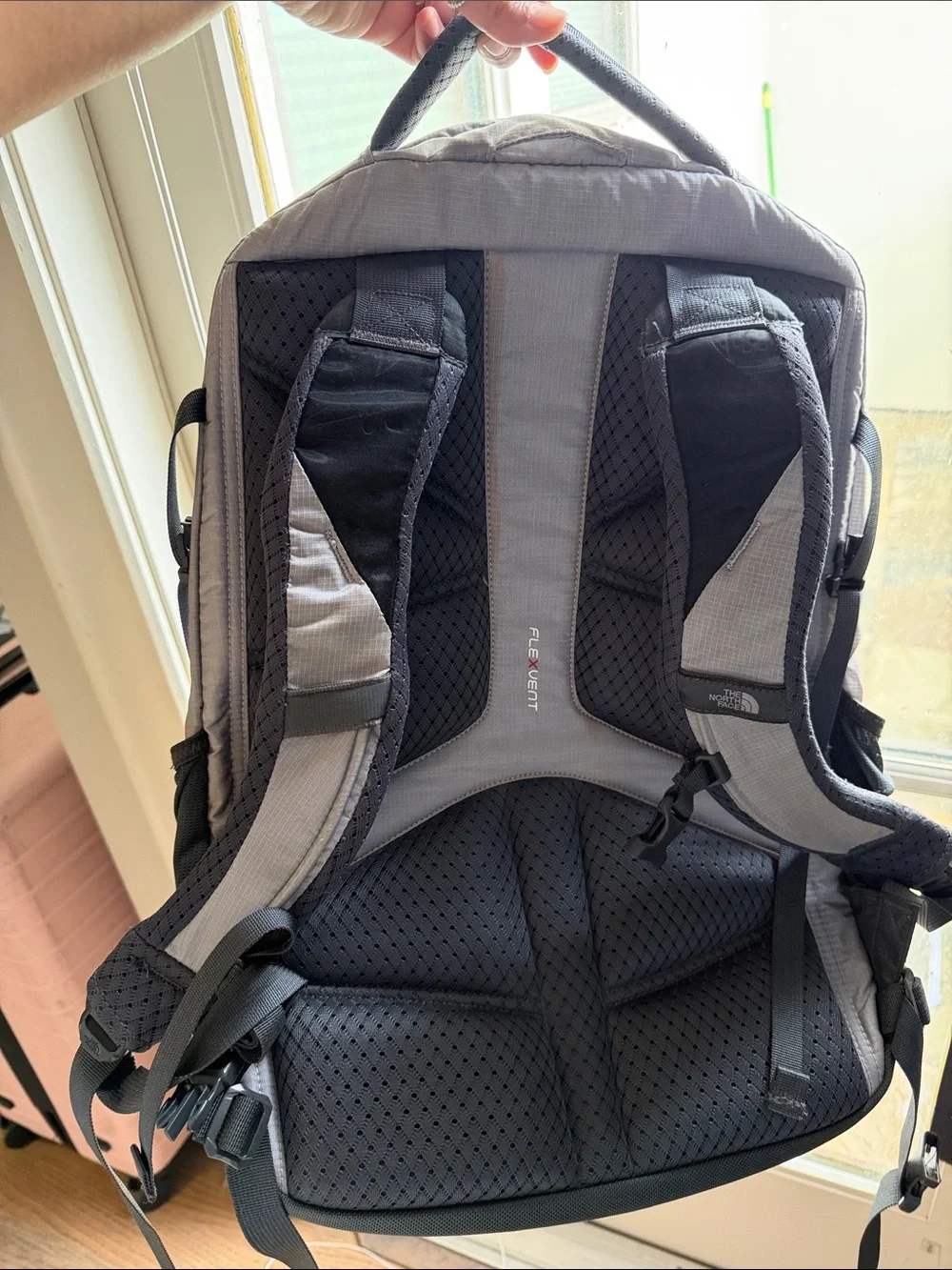 The North Face Gray Backpack with Neon Pink Accents